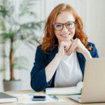 pleased-cheerful-female-economist-develops